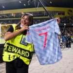 Ronald gives T-shirt to Sterward who is injured after being hit by Ronaldo's ball during a warm up before a match against Young Boys
