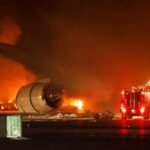 Japan Airlines a passenger plane catches fire while landing in Tokyo